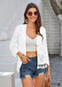 Cárdigan bohemio blanco de punto de crochet calado con borlas estilo 2024
